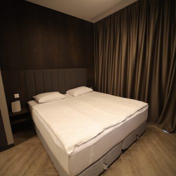 Photo of a bed in an apartment